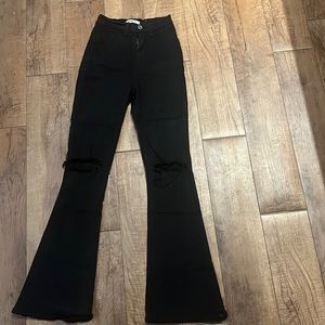 Aphrodite black knee ripped flare jeans